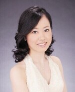 写真:ハープ奏者の桝田 希さん