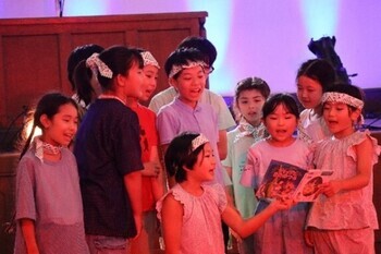 写真：令和7年度の発表会の様子（成蹊大学大講堂）